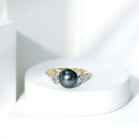 Tahitian pearl engagement ring with diamond accents from Rosec Jewels, featuring a nature-inspired design and elegant craftsmanship.