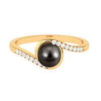 Solitaire Tahitian pearl bypass engagement ring with diamond accents by Rosec Jewels, featuring a lustrous black pearl and elegant design.