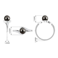 Solitaire Tahitian pearl bypass engagement ring with diamond accents by Rosec Jewels, showcasing a unique design and lustrous pearl.
