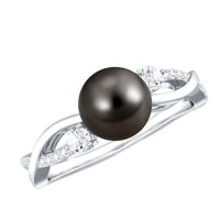 Tahitian pearl and diamond crossover engagement ring by Rosec Jewels featuring a black pearl and sparkling diamonds on a silver band.