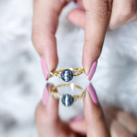 Tahitian pearl and diamond crossover engagement ring by Rosec Jewels featuring a blend of pearls and sparkling diamonds in a gold band.