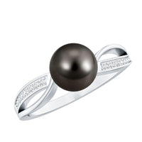 Tahitian pearl solitaire engagement ring with 7.25 carat diamond setting, featuring a rose gold band and elegant design.