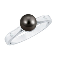Solitaire black Tahitian pearl engagement ring by Rosec Jewels featuring a single pearl and elegant band.