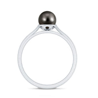 Black Tahitian pearl solitaire engagement ring by Rosec Jewels featuring a single elegant pearl on a sleek band.