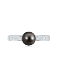 Solitaire black Tahitian pearl engagement ring by Rosec Jewels featuring a single lustrous pearl and elegant band.