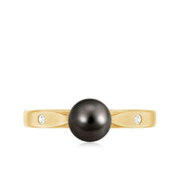 Solitaire black Tahitian pearl engagement ring by Rosec Jewels featuring a single pearl on a sleek band with certificate.