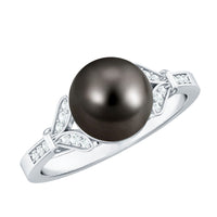 Tahitian pearl and diamond engagement ring with split shank design by Rosec Jewels, featuring a central pearl surrounded by sparkling diamonds.