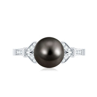 Tahitian pearl and diamond engagement ring with split shank from Rosec Jewels, featuring a lustrous black pearl and sparkling diamonds.