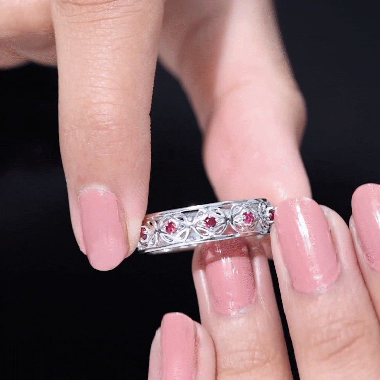 Vintage style lab-created ruby Celtic wedding band by Rosec Jewels featuring intricate design and a certificate of authenticity.
