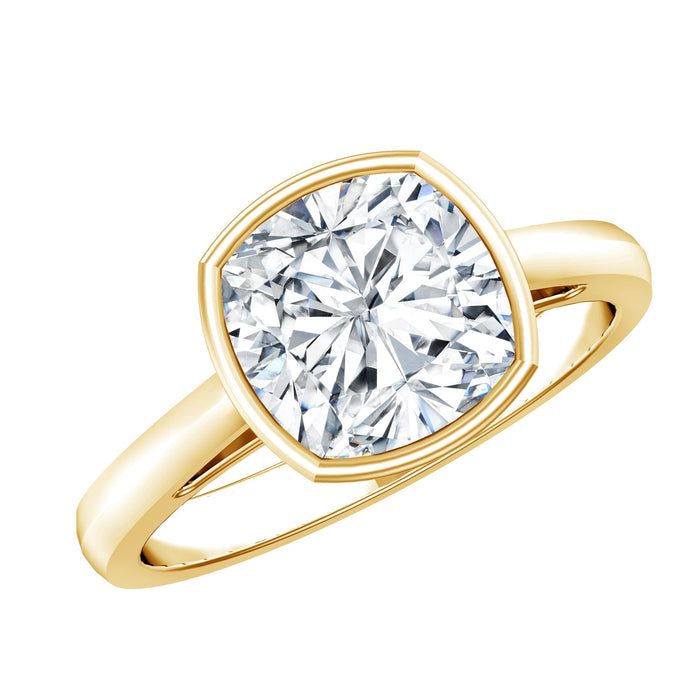 Bezel set cushion cut moissanite solitaire engagement ring featuring a sparkling center stone and sleek band from Rosec Jewels.
