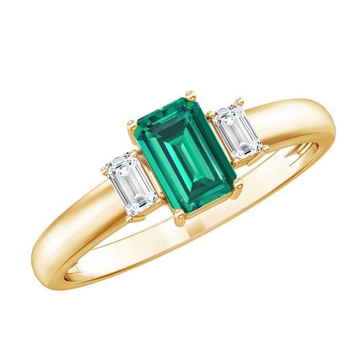 Emerald cut emerald and diamond 3-stone promise ring for her by Rosec Jewels, showcasing elegant platinum band and sparkling gemstones.