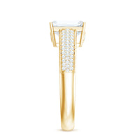 Emerald cut moissanite side stone engagement ring from Rosec Jewels with a central gemstone and side accents in a elegant ring setting