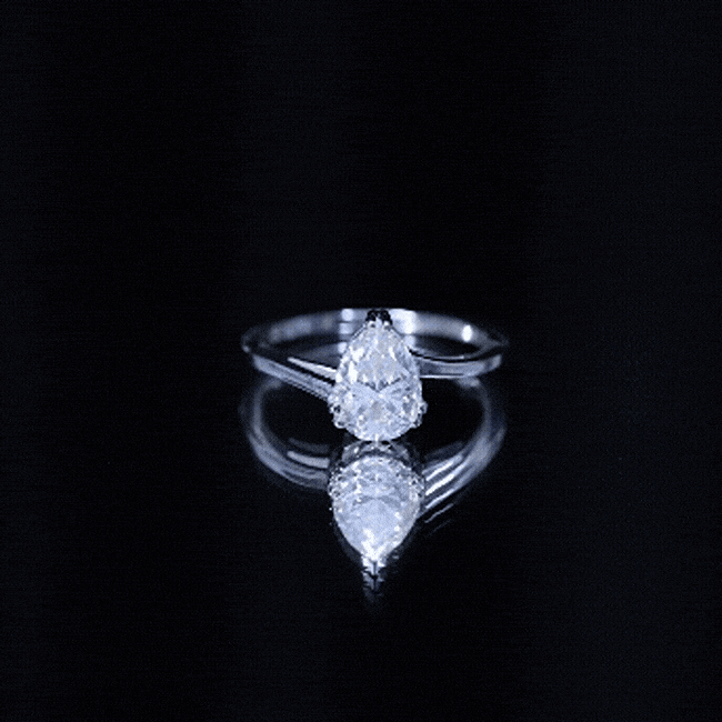 Yellow gold Pear-shaped engagement ring featuring a certified Moissanite gemstone from Rosec Jewels.