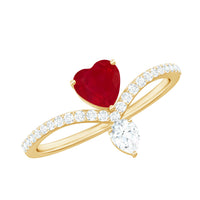 Natural 0.6 carat ruby heart promise ring with diamond chevron shank by Rosec Jewels, showcasing a ruby heart and sparkling diamonds.