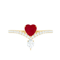 Natural 0.6 carat ruby heart promise ring with diamond chevron shank from Rosec Jewels, showcasing a romantic ruby heart and sparkling diamonds.