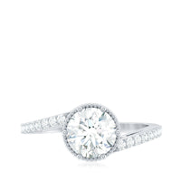 Round cut solitaire zircon bypass engagement ring by Rosec Jewels, showcasing a sleek band with a central sparkling zircon stone.