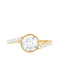 Round cut solitaire zircon bypass engagement ring from Rosec Jewels featuring a sleek band and sparkling central stone.