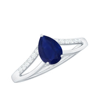Pear cut blue sapphire solitaire ring with diamond accents and split shank design by Rosec Jewels, showcasing elegant fine jewelry craftsmanship.