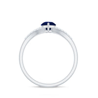 Pear cut blue sapphire solitaire ring with diamond accents and split shank design from Rosec Jewels.
