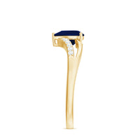Pear cut blue sapphire solitaire ring with split shank design and diamond accents by Rosec Jewels, showcasing the elegant jewelry piece.