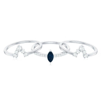 Stackable ring set featuring marquise cut blue sapphire and diamond accents from Rosec Jewels, showcasing three elegant rings.
