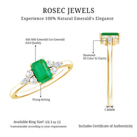 Emerald cut emerald engagement ring with diamond trio accents, showcasing a Rosec Jewels ring with detailed craftsmanship and elegant design.