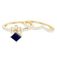 Rosec Jewels blue sapphire and diamond princess cut wedding ring set with floral design, featuring intricate detailing and sparkling stones.
