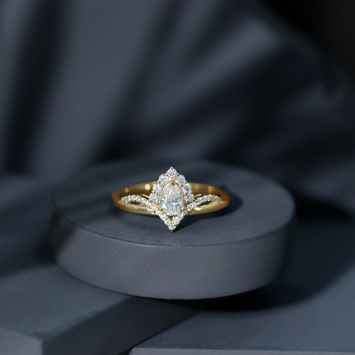 Pear-shaped 0.79 carat Moissanite engagement ring from Rosec Jewels featuring a sparkling, elegant design.