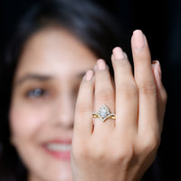 Pear-shaped 0.79 carat moissanite engagement ring from Rosec Jewels featuring a luxurious designer ring style.