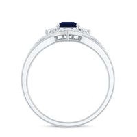 Pear cut blue sapphire solitaire ring with diamond accents by Rosec Jewels, featuring a sleek silver band and elegant design