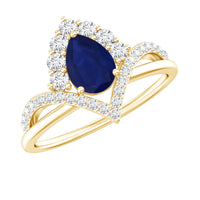 Pear cut blue sapphire solitaire ring with diamond accents by Rosec Jewels, showcasing a elegant blue gemstone and sparkling details.