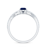 Pear-shaped blue sapphire engagement ring with split shank design by Rosec Jewels featuring a 0.5 carat gemstone and certification.
