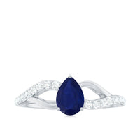 Pear-shaped blue sapphire engagement ring with split shank design by Rosec Jewels, featuring a 0.5 carat gemstone and certificate.