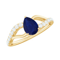 Genuine 0.5 carat pear-shaped blue sapphire engagement ring with split shank design and certificate from Rosec Jewels.