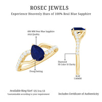 Pear-shaped 0.5 carat blue sapphire engagement ring with split shank design by Rosec Jewels, featuring a certificate.
