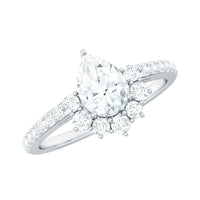 Moissanite teardrop engagement ring with half halo, featuring a sparkling center stone and intricate band design from Rosec Jewels.