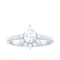 Rosec Jewels moissanite teardrop engagement ring with half halo and intricate band design, showcasing sparkling center stone.