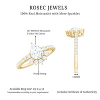 Moissanite teardrop engagement ring with half halo setting from Rosec Jewels, showcasing sparkling center stone and intricate band detail.
