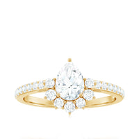 Moissanite teardrop engagement ring with half halo, featuring rose gold band and intricate detailing, by Rosec Jewels.
