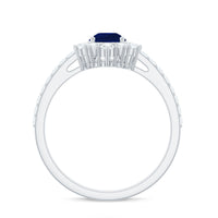 Pear-shaped blue sapphire and diamond half halo engagement ring by Rosec Jewels, showcasing a 0.5 carat center stone and intricate design.