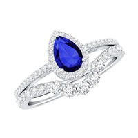 Pear-shaped blue sapphire engagement ring set with diamonds from Rosec Jewels, featuring a stunning lab-grown blue sapphire centerpiece.