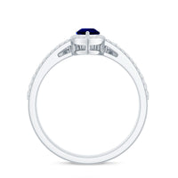 Blue sapphire and diamond pear-shaped engagement ring set by Rosec Jewels, featuring a sparkling lab-grown gemstone and elegant band.