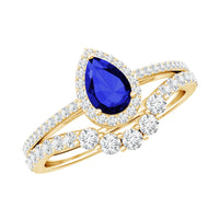 Pear-shaped blue sapphire and diamond engagement ring set by Rosec Jewels featuring lab-grown gemstones and intricate band design.