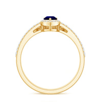 Pear-shaped blue sapphire and diamond engagement ring set by Rosec Jewels featuring lab-grown stones and intricate detailing.