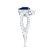 Pear-shaped blue sapphire engagement ring with diamond crossover detail, featuring a 0.5 carat sapphire centerpiece by Rosec Jewels