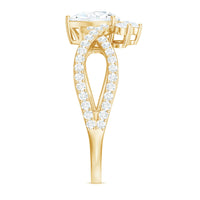 Pear-shaped moissanite crossover engagement ring by Rosec Jewels featuring a designer ring with intricate band design.