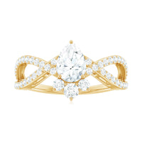 Pear-shaped moissanite crossover engagement ring by Rosec Jewels featuring a designer pear-shaped moissanite centerpiece and intricate band details.