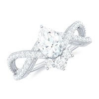 Two-carat pear-cut cubic zirconia crossover engagement ring by Rosec Jewels, showcasing sparkling stones and intricate band design.