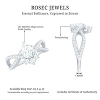 Pear cut cubic zirconia crossover engagement ring by Rosec Jewels featuring two carats of sparkling stones on a sleek band