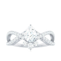 Pear cut cubic zirconia crossover engagement ring by Rosec Jewels, showcasing a sparkling 2-carat design with intricate band details.
